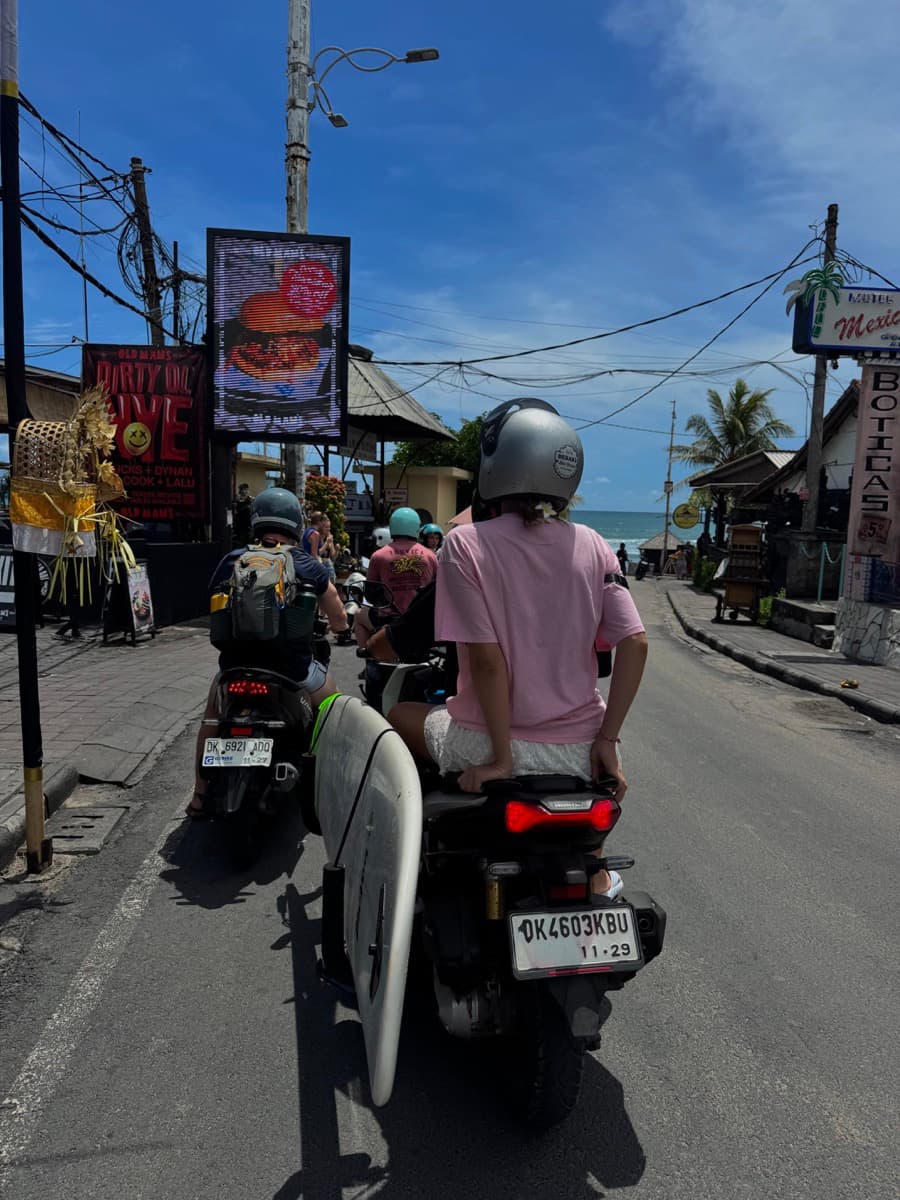 Scooter riders heading toward the ocean